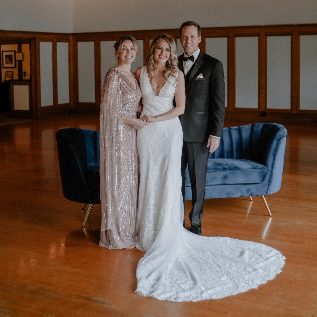 bride with her mom and stepdad.