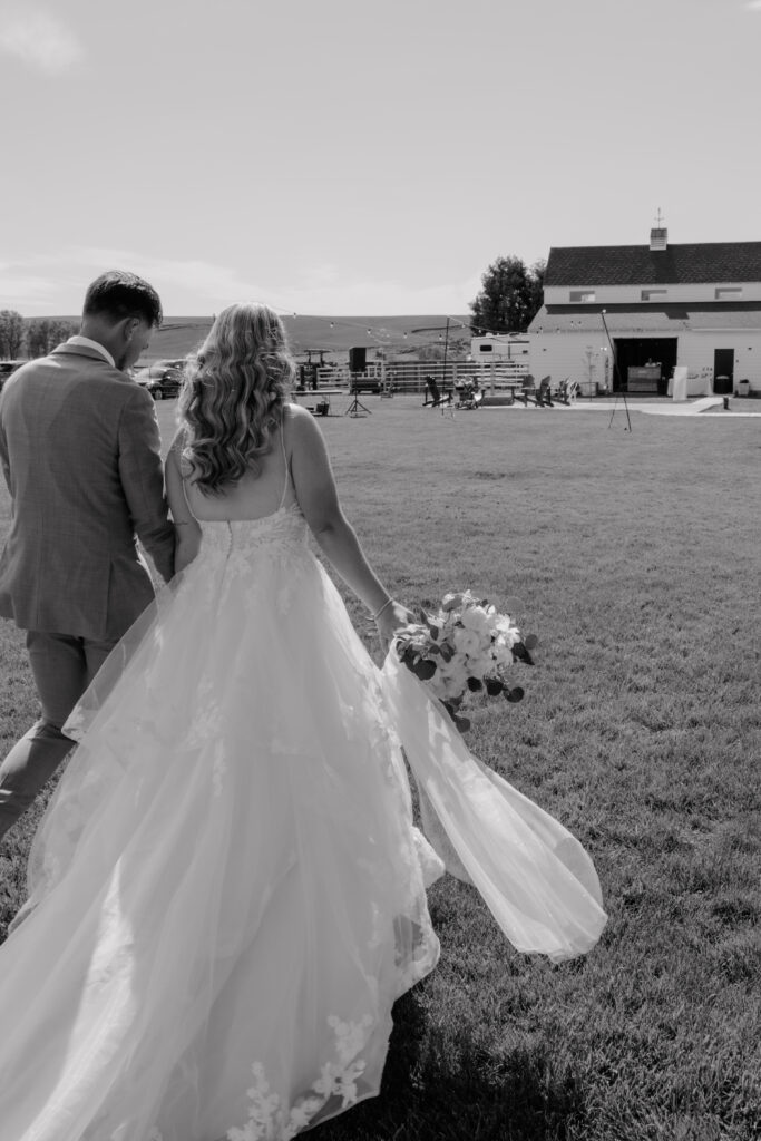 bride and groom walking away from the ceremony.