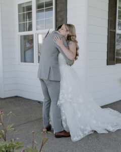 bride and groom hugging during the first look.