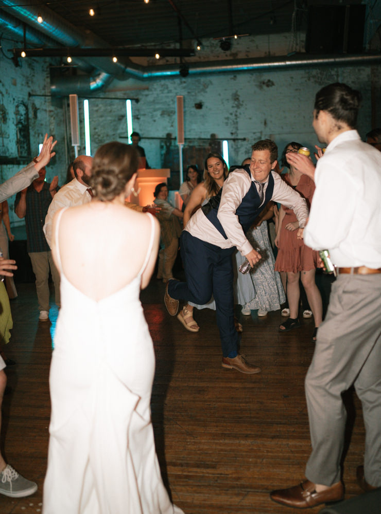 Groom dancing on the dance floor at Overbluff Cellars.