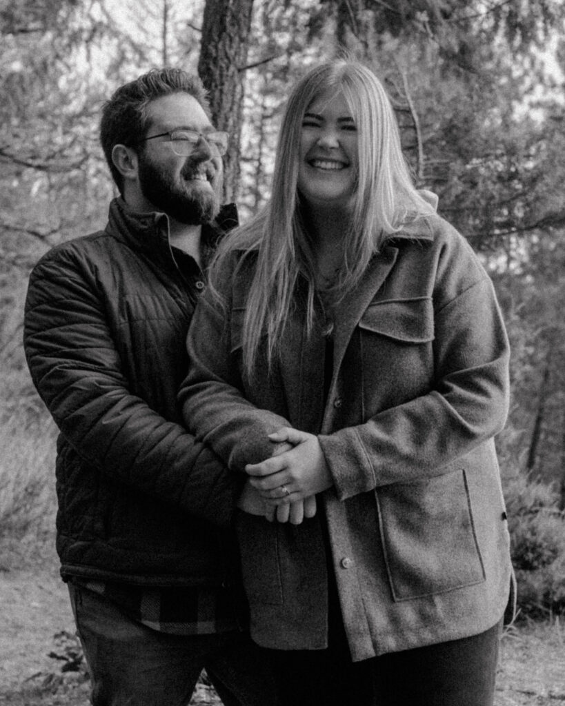 Idaho Winter Couples Session where the husband is looking at hos wife and she is smiling.