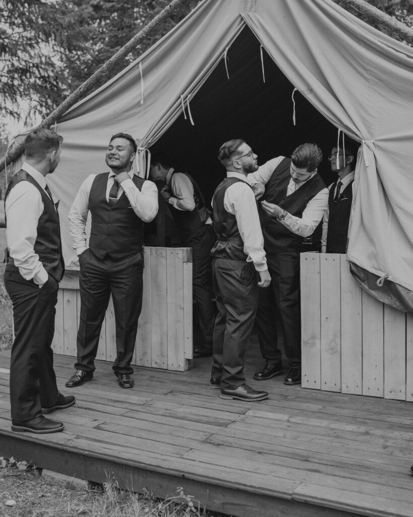 groom and groomsmen getting ready at Kaniksu Pines Farm in North Idaho