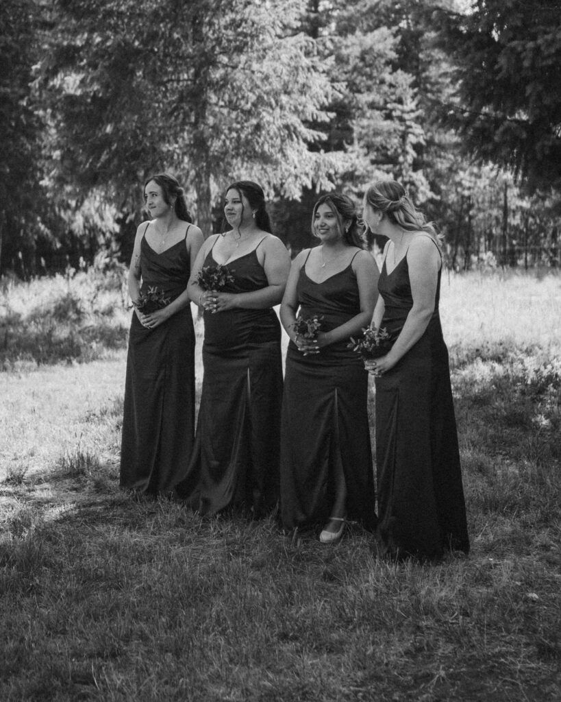 bridesmaids looking on at the bride coming up the aisle 
